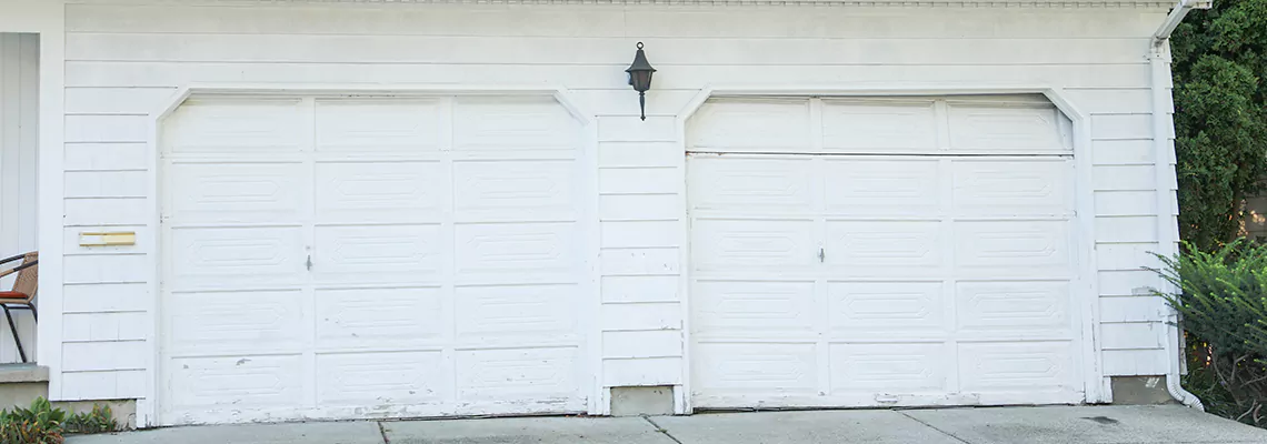 Roller Garage Door Dropped Down Replacement in Tampa, FL