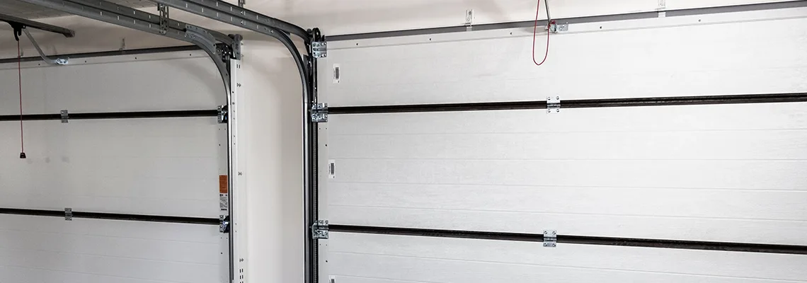 Fix Folding Garage Door Jerking in Tampa, Florida